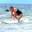 *PREMIUM-EXCLUSIVE* Sam and Lara Worthington hit the waves for a surfing session in Costa Rica