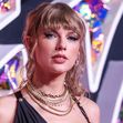 (FILE) Taylor Swift and Travis Kelce are engaged. NEWARK, NEW JERSEY, USA - SEPTEMBER 12: American singer-songwriter and cultural icon Taylor Swift wearing a Versace dress arrives at the 2023 MTV Video Music Awards held at the Prudential Center on Septemb