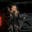 Pamela Anderson arrives with a smile on her face at the Mugler H&amp;M Global Launch Event in NYC