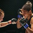 BRUISED 2020 Netflix film with Halle Berry as aging mixed-martial arts fighter Jackie Justice at right facing Valentina Shevchenko as Lady Killer