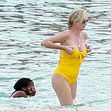 Charlize Theron in costum de baie