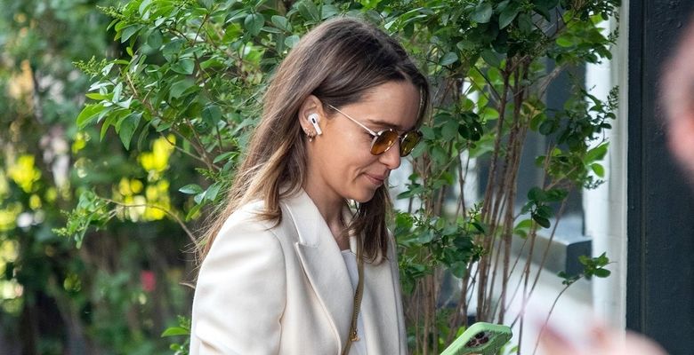 *EXCLUSIVE* British actress Emilia Clarke cuts a stylish figure in a Beige shoulder-padded jacket with a matching beige skirt as she's seen out and about in Soho, London.