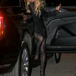 Pamela Anderson arrives with a smile on her face at the Mugler H&amp;M Global Launch Event in NYC