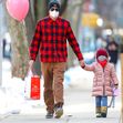 EXCLUSIVE: Bradley Cooper Holds A Pink Ballon While Hand-In-Hand With Daughter Lea De Seine Shayk Cooper As They Take A Stroll In New York City