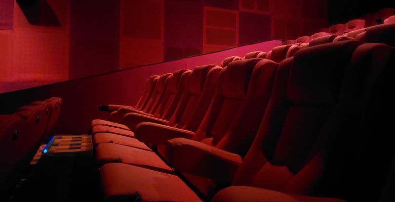 Empty,Red,Seats,In,Platinum,Cineplex,Cinema,In,The,Dark