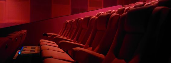 Empty,Red,Seats,In,Platinum,Cineplex,Cinema,In,The,Dark