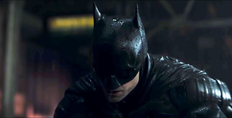 Colin Farrell is completely unrecognizable as The Penguin while Robert Pattinson sports a smokey-eyed look as the Caped Crusader in first trailer for The Batman
