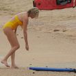 Charlize Theron in costum de baie