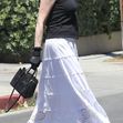 *EXCLUSIVE* Melanie Griffith shows off her new tattoo that replaced her ex-partner's name***web must call for pricing***
