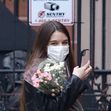 Suri Cruise celebrates her 15th birthday with friends, ice-cream and posing for selfies with a bouquet of flowers while mom Katie is seen on a solo outing in NYC