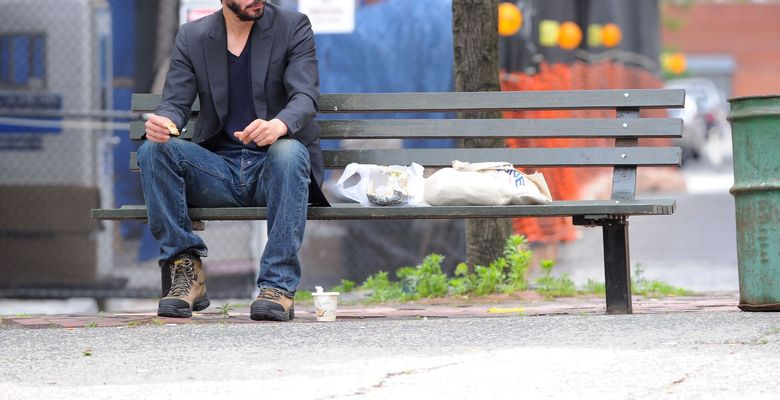 These photos of Keanu Reeves looking downcast prompted over 14,000 people to join 'Cheer Up Keanu' campaign