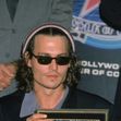 Johnny Depp Holding His Star