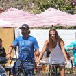 *EXCLUSIVE* Gerard Butler rides his electric bike to lunch with girlfriend Morgan Brown and a buddy