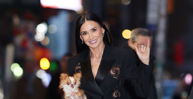 Demi Moore carries her pup Pilaf as she arrives to CBS studios in New York, NY