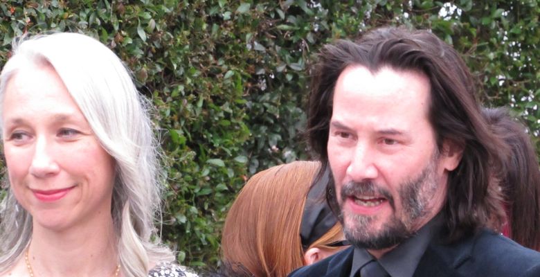 Here are the new unearthed photos of Keanu Reeves smiling and beaming as he stares lovingly at artist Alexandra Grant