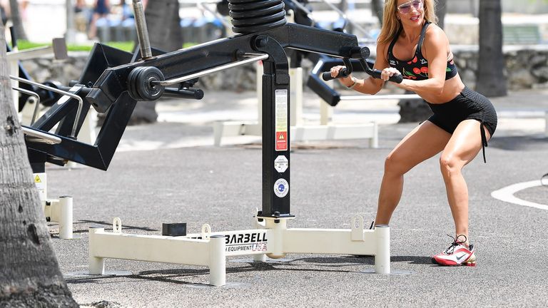 American fitness model Jennifer Nicole Lee seen working out and then heading to the ocean to cool off in Miami Beach,Florida