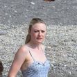 EXCLUSIVE: Dakota Fanning seen in a one-piece swimsuit filming "Ripley" in Strani, Amalfi Coast