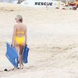 Charlize Theron in costum de baie