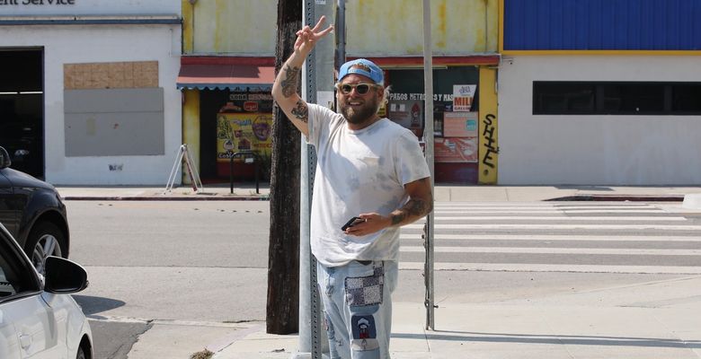 *EXCLUSIVE* Jonah Hill spreads peace while out and about in Venice
