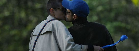 PREMIUM EXCLUSIVE: Rami Malek and Emma Corrin tenderly kiss while dog walking in a London park - publicly confirming their relationship for the first time
