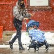 Russian Model Irina Shayk seen pushing her daughter lea in her stroller while braves the snow in New York City