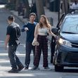 EXCLUSIVE: Michelle Williams Waits in The Car While Husband Thomas Kail and Daughter Matilda Ledger Chat With a Passerby in New York City.
