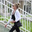 *EXCLUSIVE* Melanie Griffith stops by a friend's place with some leftover food