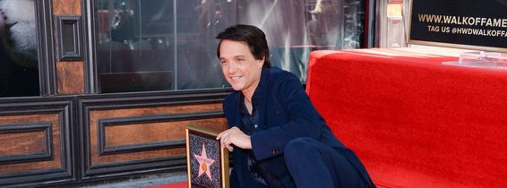 Ralph Macchio poses with his new star on the Hollywood Walk of Fame on November 20, 2024 in Hollywood, California.