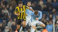 Elliot Anderson #5 of Manchester City F.C.challenged by Razvan Marin #18 of AEK Athens F.C. during the UEFA Champions League Stage match between Manchester City and AEK Athens at the Etihad Stadium, Manchester on Tuesday 20th October 2026. (Photo: Mike Mo