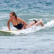 *PREMIUM-EXCLUSIVE* Sam and Lara Worthington hit the waves for a surfing session in Costa Rica