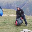 EXCLUSIVE: Hiker stunned while out walking as Tom Cruise lands in helicopter and makes parachute jump