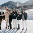 Kate Hudson poses on a horse and with a giant dog at the St. Regis World Snow Polo Championship in Aspen, Colorado
