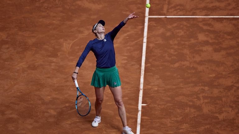 Mutua Madrid Open - Day Two Irina-Camelia Begu of Romania serves against Linda Fruhvirtova of the Czech Republic during