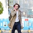 *EXCLUSIVE* English actor Aaron Taylor-Johnson show's off his bulging biceps as he's pictured meeting a friend while out and about in Notting Hill.