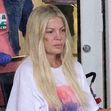 EXCLUSIVE: **PREMIUM EXCLUSIVE RATES APPLY** Bruised And Battered Tori Spelling Leaves The Hospital In A Wheelchair With Visible Marks On Her Face And Arms After Mystery Accident