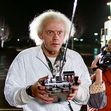 USA. Michael J. Fox and Christopher Lloydin a scene from ©Universal Pictures  film:  Back to the Future (1985).Plot: Marty McFly, a 17-year-old high school student, is accidentally sent thirty years into the past in a time-traveling DeLorean invented by
