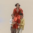 EXCLUSIVE: *NO DAILYMAIL ONLINE* â€�Bombshellâ€™ Ana De Armas Looks Glamorous As She Is Carried By Her Costars While Filming Scenes On A Gold Coast Beach In Australia For Her Role In Ron Howard's 'Survival Thriller' Film, "Edenâ€ť