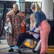 EXCLUSIVE: **PREMIUM EXCLUSIVE RATES APPLY** Bruised And Battered Tori Spelling Leaves The Hospital In A Wheelchair With Visible Marks On Her Face And Arms After Mystery Accident