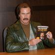 Will Ferrell, As Character Ron Burgundy Signing For "Let Me Off At The Top: My Classy Life And Other Musings"