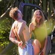 EXCLUSIVE: *NO DAILYMAIL ONLINE* Simon Baker Suffers A Cheeky Wetsuit Wardrobe-Malfunction During A Surf Session With Girlfriend Laura May Gibbs In Byron Bay