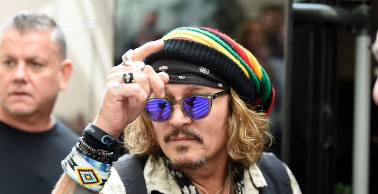 The American Actor Johnny Depp and Jeff Beck seen leaving their Manchester Hotel.