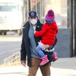 Bradley Cooper carries his daughter Lea while out and about in New York City