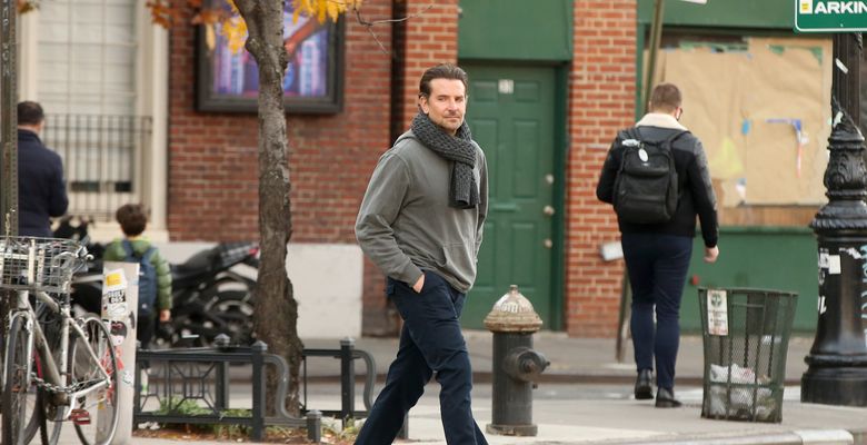 Bradley Cooper wears a knitted scarf as a jacket in New York City