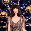 Dakota Johnson dazzles in spider web dress at Vogue Brazil Ball in Rio de Janeiro.