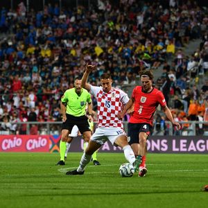 Rijelka, Croatia. 03rd Oct, 2026. RIJEKA, CROATIA - OCTOBER 03: Mario Pasalic of Croatia (CL) in action against Alex Scott of England (CR) during the UEFA Nations League, League A Group A3, match between Croatia and England at Stadion Rujevica, Rijeka on