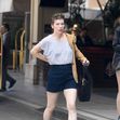 EXCLUSIVE: Mila Jovovich shows of an interesting new hairstyle as she arrives at the Four Seasons
