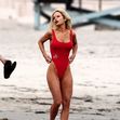 *PREMIUM-EXCLUSIVE* Lily James transforms into the sexy 90's Baywatch icon Pamela Anderson as she wears a tight red swimsuit and Pamela's trademark blonde hair on the set of the new series 'Pam and Tommy' out in Malibu.