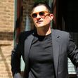 Orlando Bloom looks sharp in a suit as he leaves for 'Late Night with Seth Meyers'. in New York City